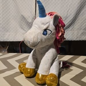 "Spirit" Unicorn  Kohl's Cares White Fabric Care Tag with Black Print